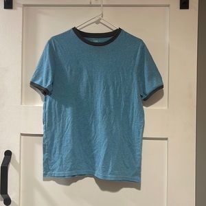 Teal Shirt with Navy Blur outlines.